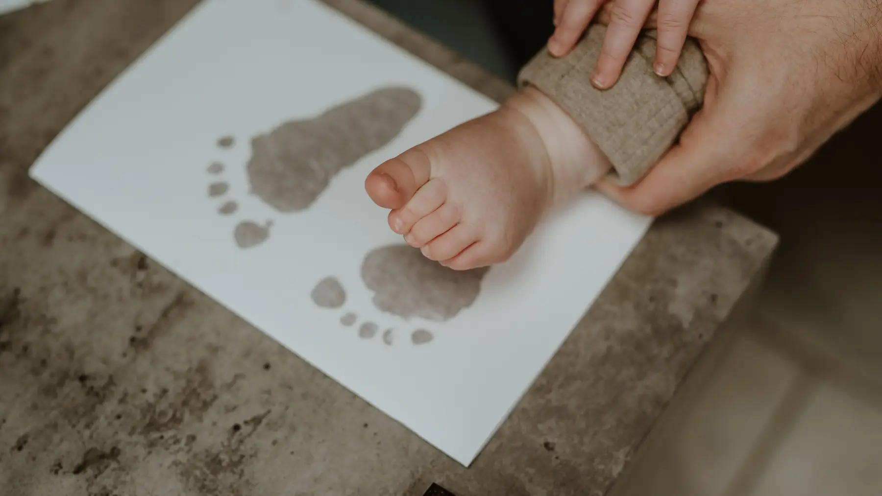 Taking a baby's footprints at home