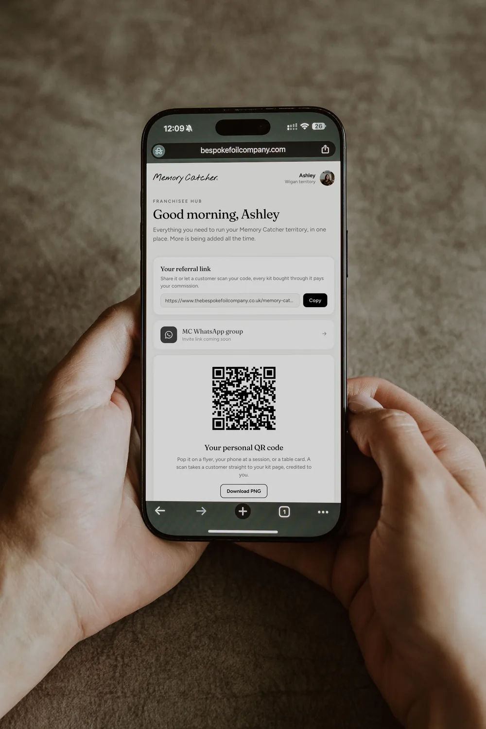 A Memory Catcher sharing their personal referral link and QR code from the Hub