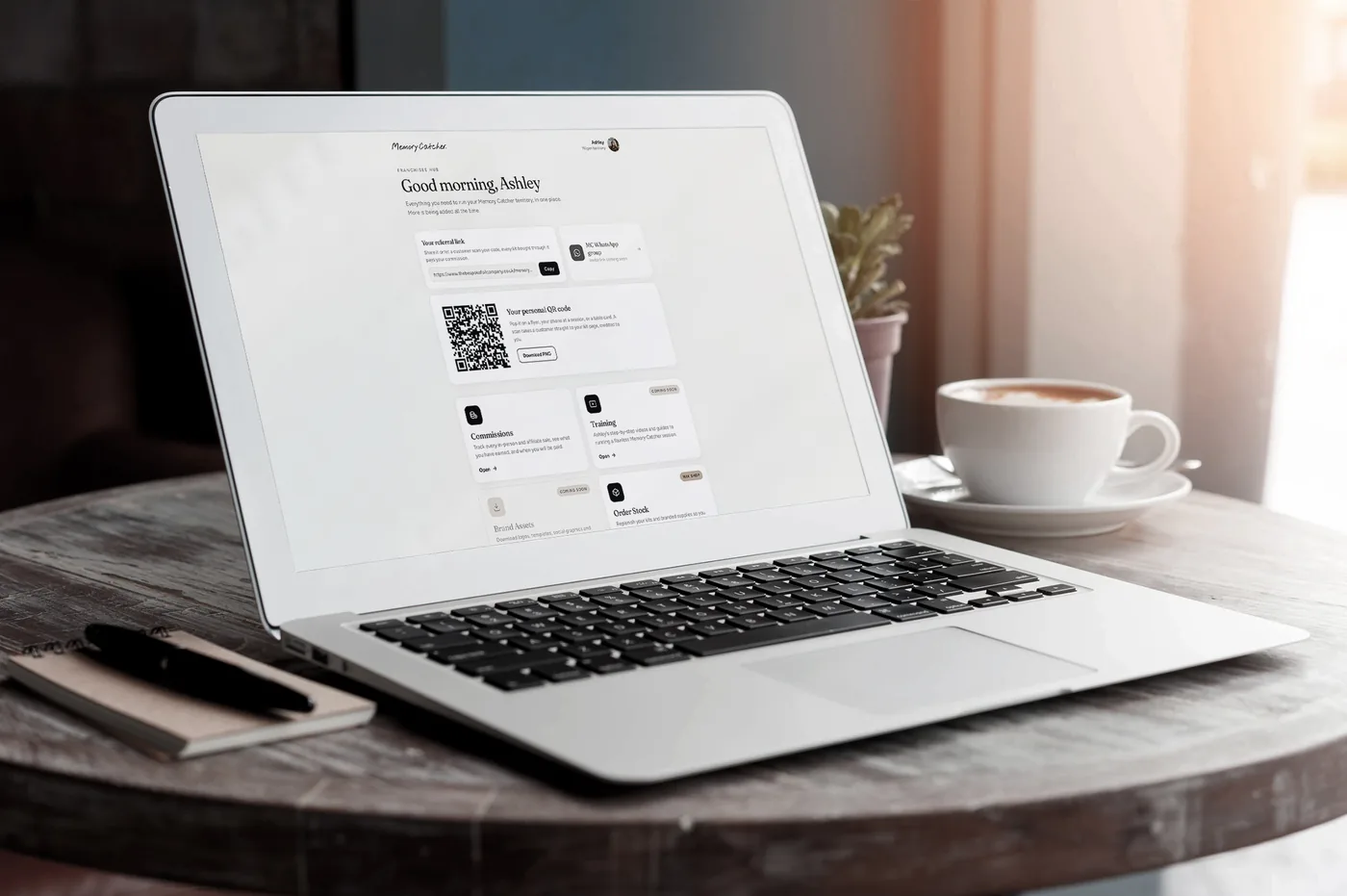 The Memory Catcher Hub dashboard open on a laptop