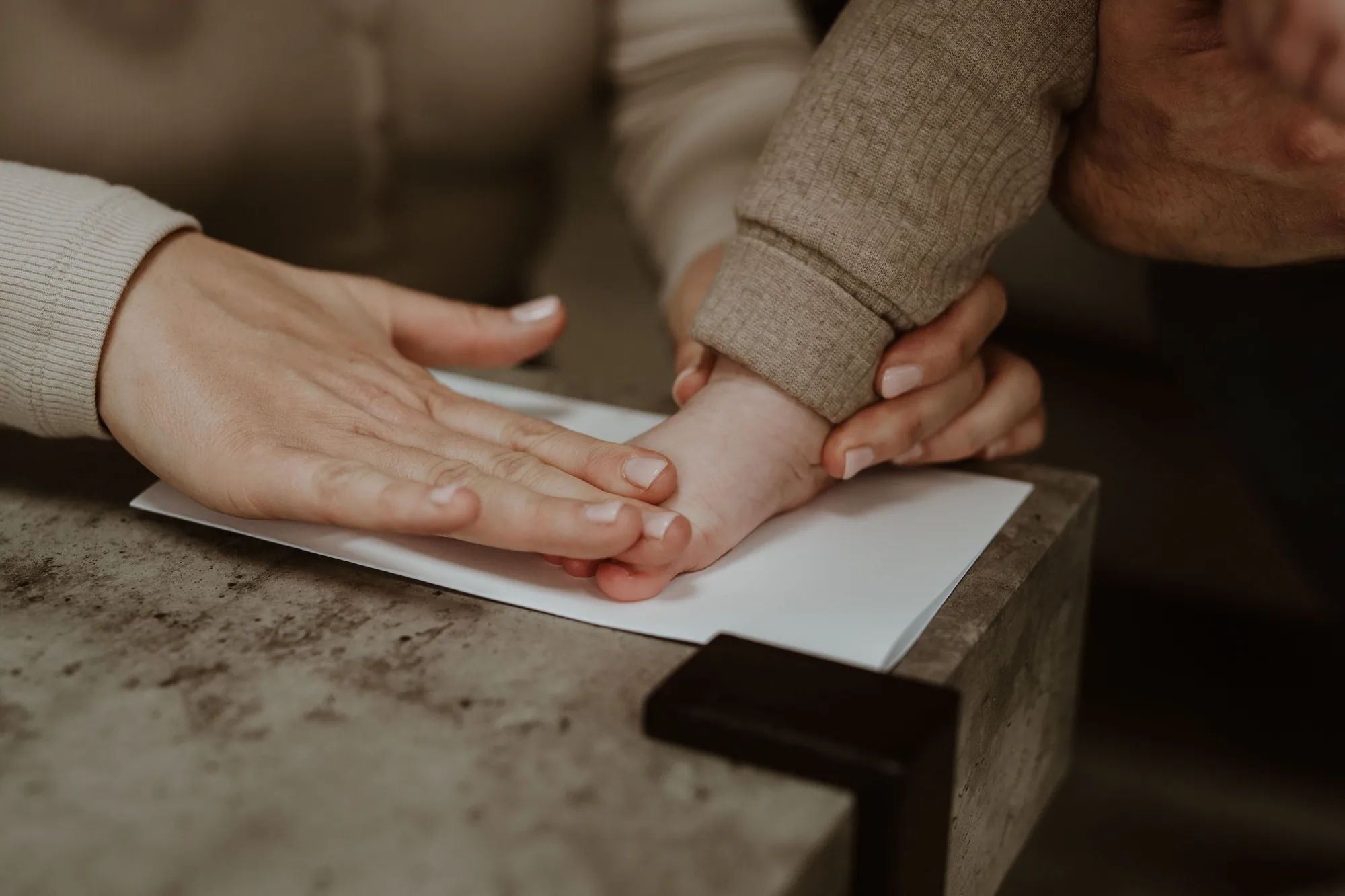 A Memory Catcher taking a baby's prints