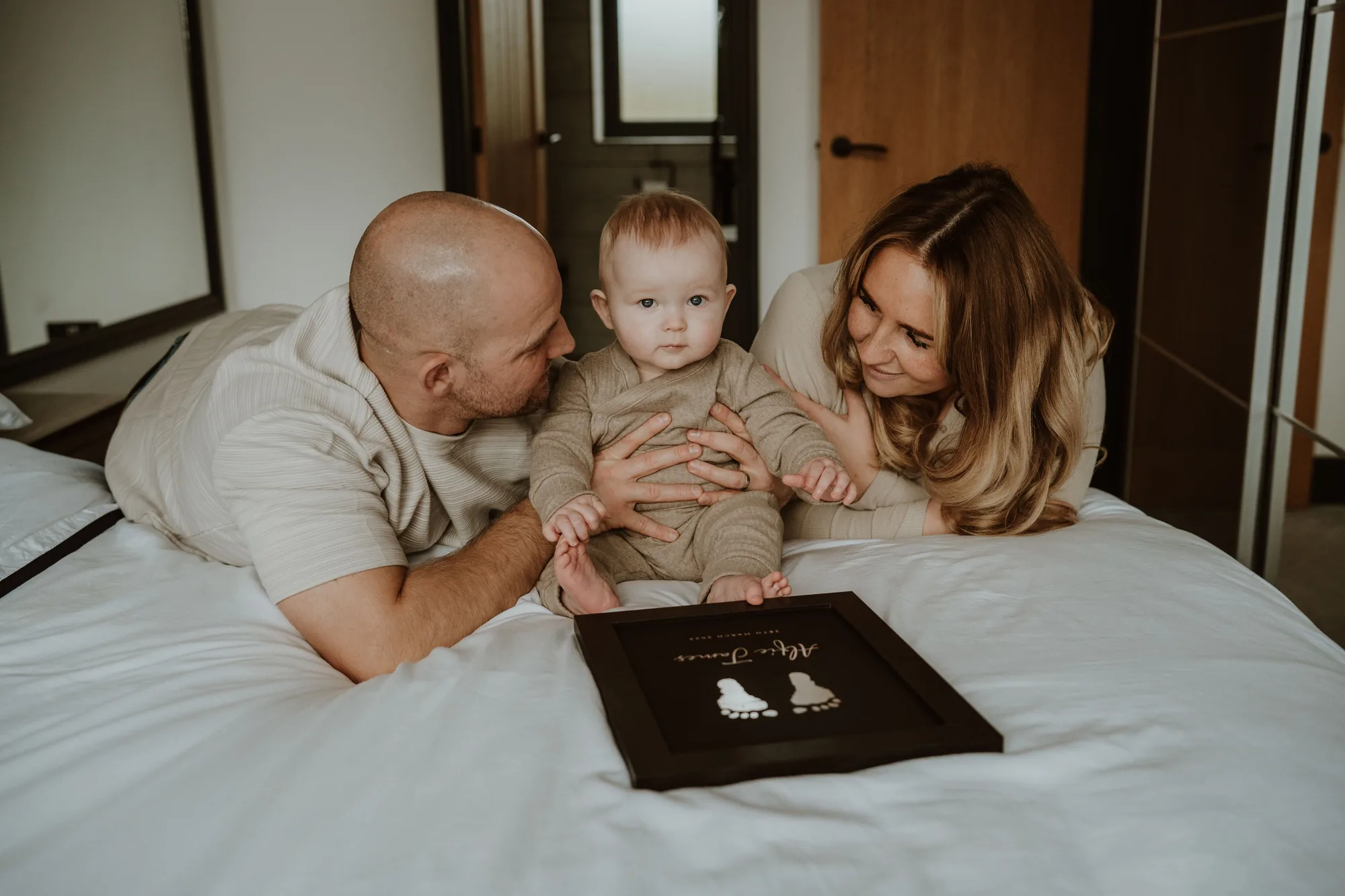 A finished foil keepsake with a family