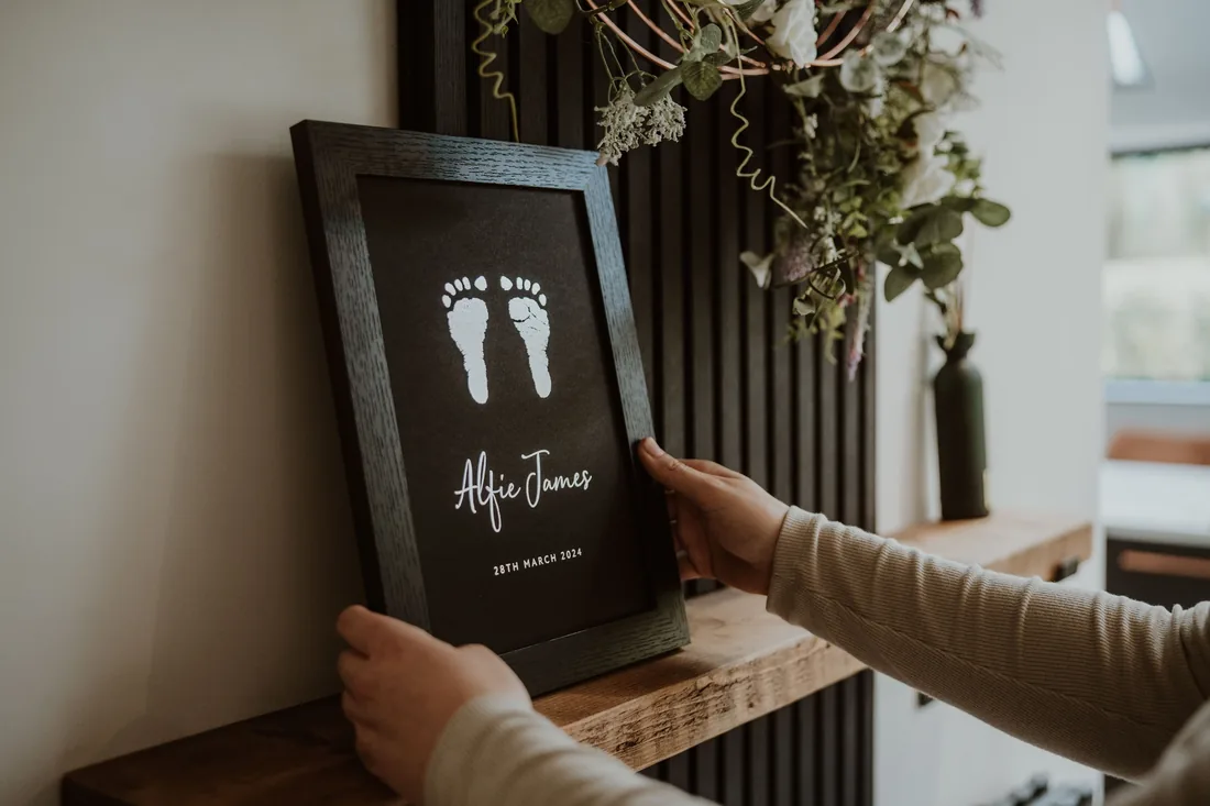 A finished foil keepsake being placed