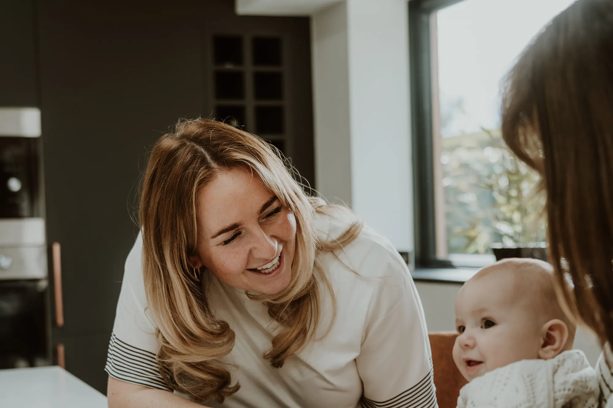 A parent and baby at a Memory Catcher session