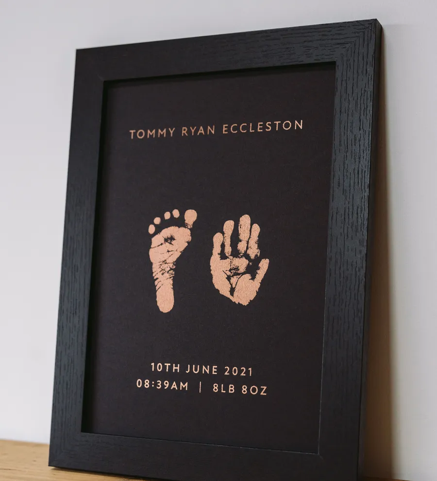 A framed foil footprint keepsake