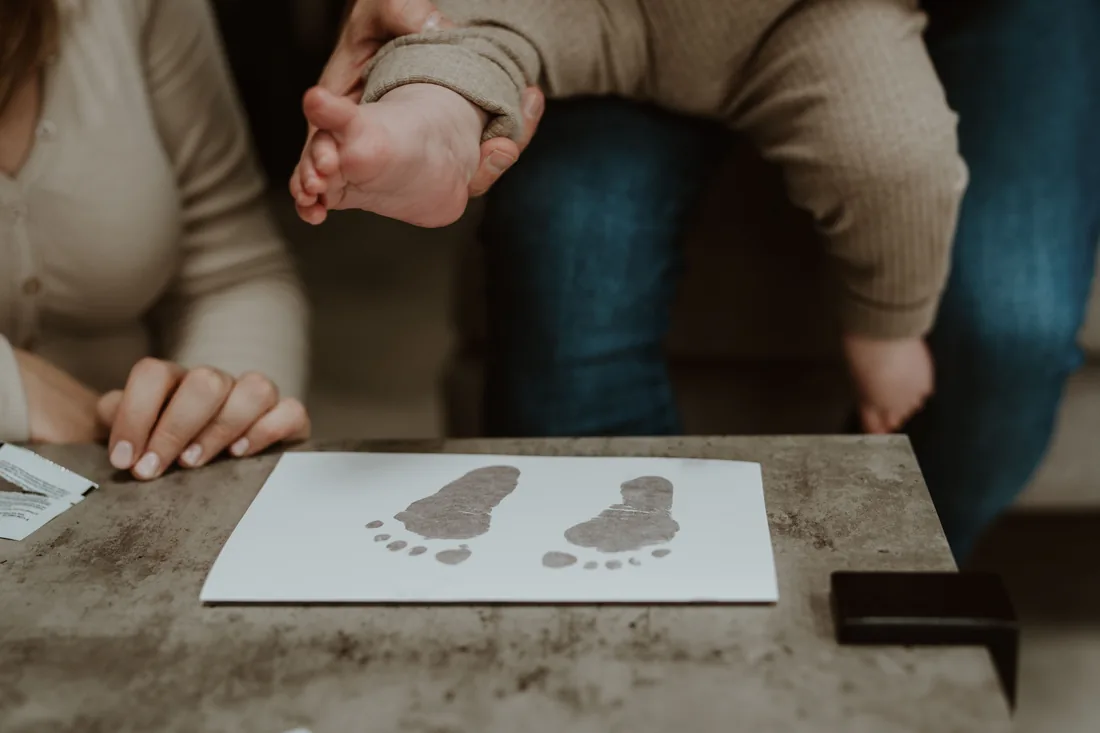A Memory Catcher taking a baby's prints