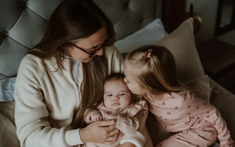 Megan with her daughters